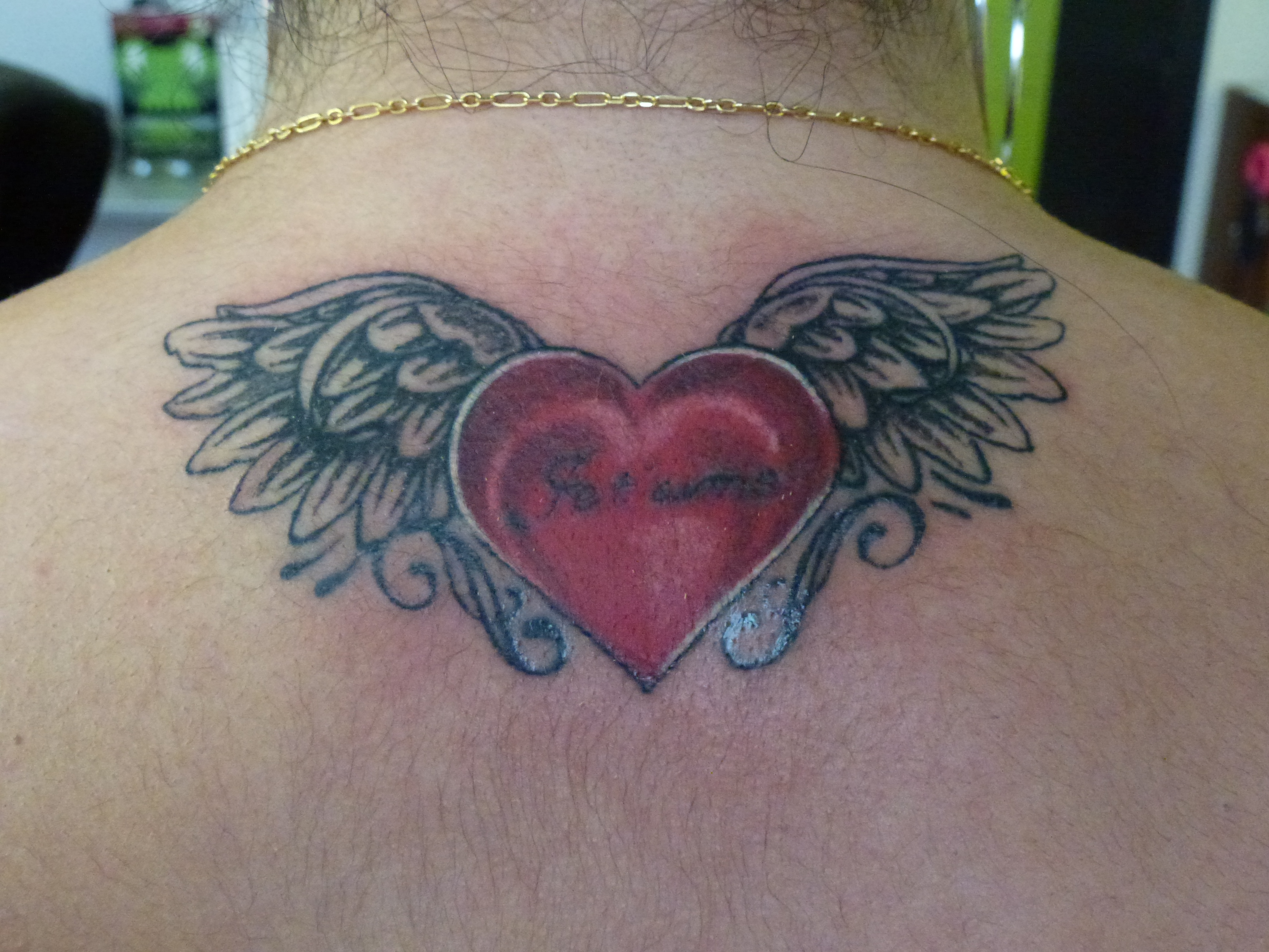 tatouage ange avec coeur