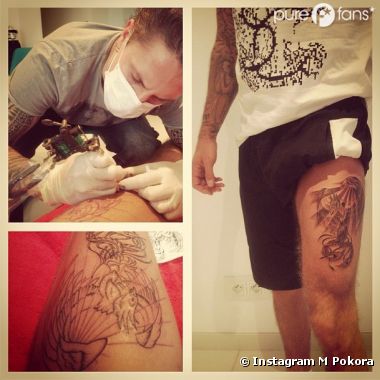 tatouage ange sur la cuisse