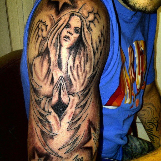 tatouage ange sur le bras