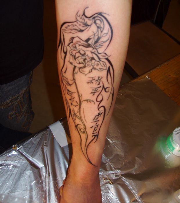 tatouage avant bras flamme