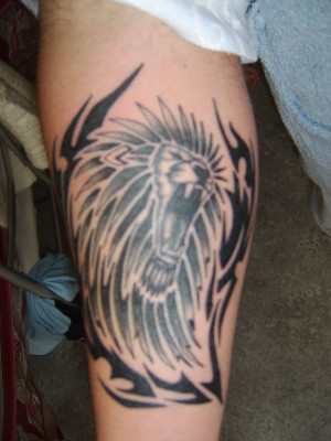 tatouage avant bras lion