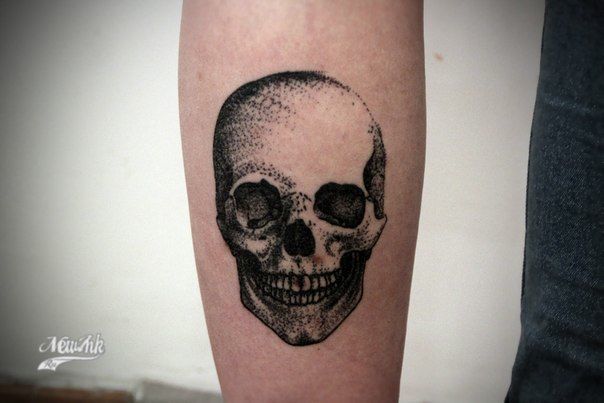 tatouage avant bras tête de mort