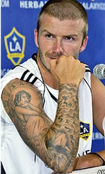 tatouage bras complet beckham