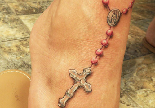 tatouage chapelet ventre