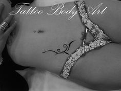 tatouage femme bas du ventre original