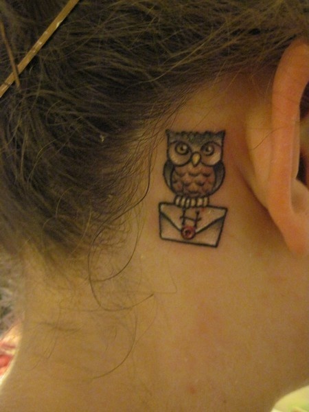 tatouage hibou nuque