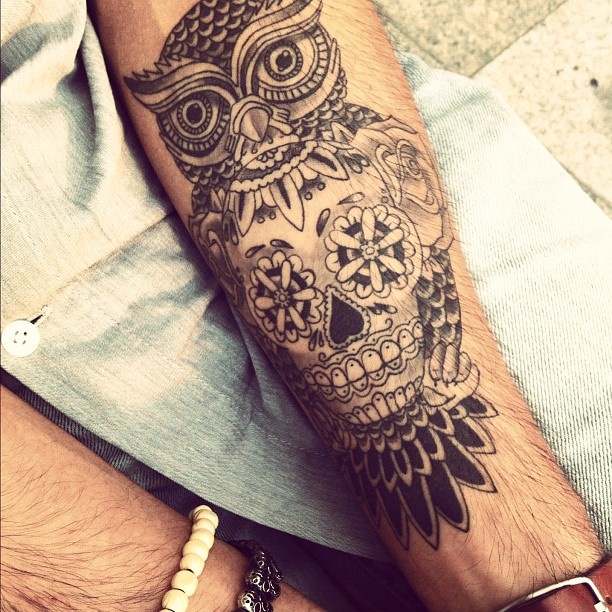 tatouage hibou tribal