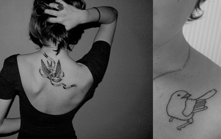 tatouage hirondelle arabesque