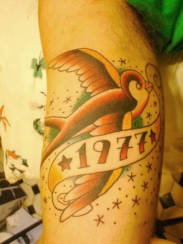 tatouage hirondelle rockabilly