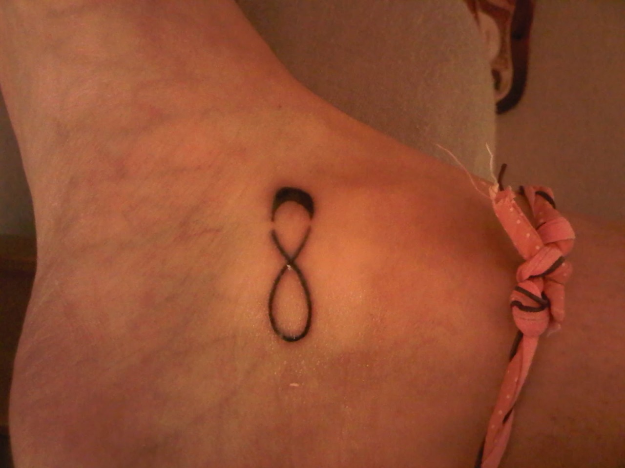 tatouage infini cheville