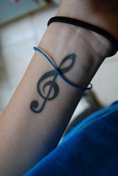 tatouage infini clé de sol