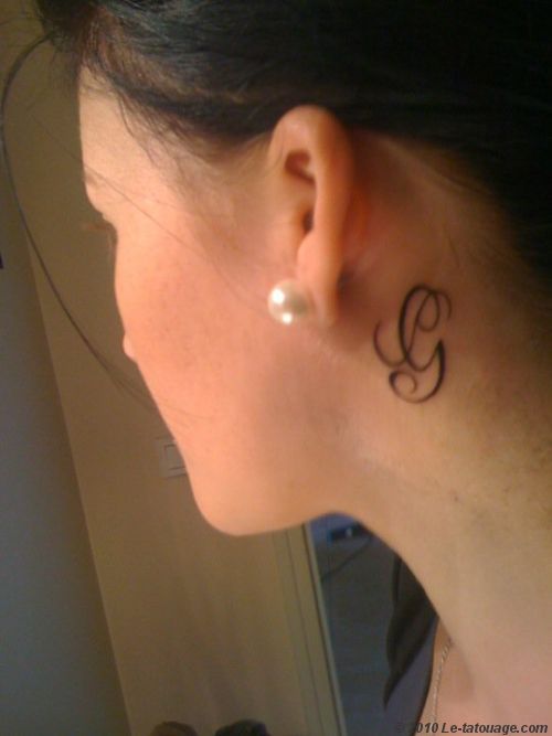 tatouage initiale g
