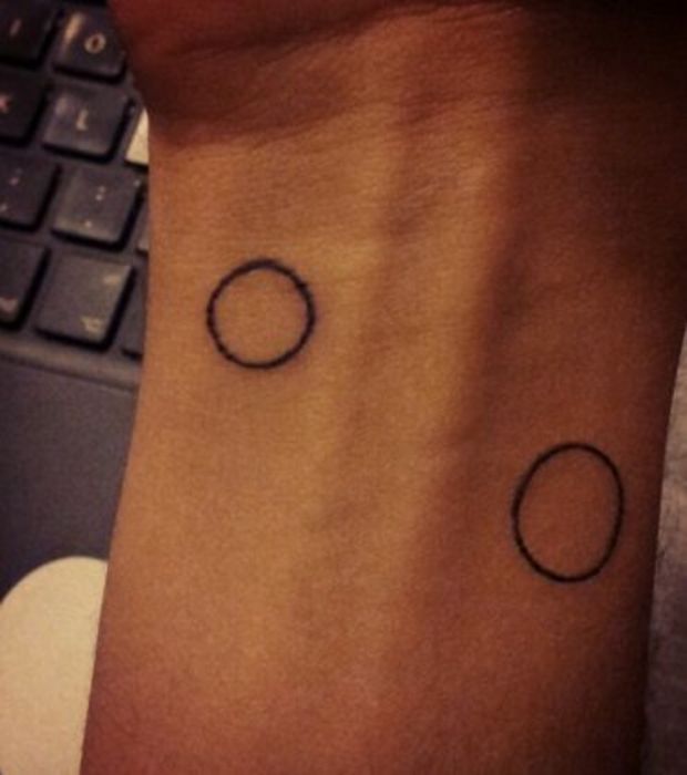 tatouage initiale g