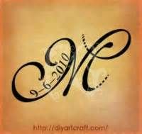 tatouage initiale m c