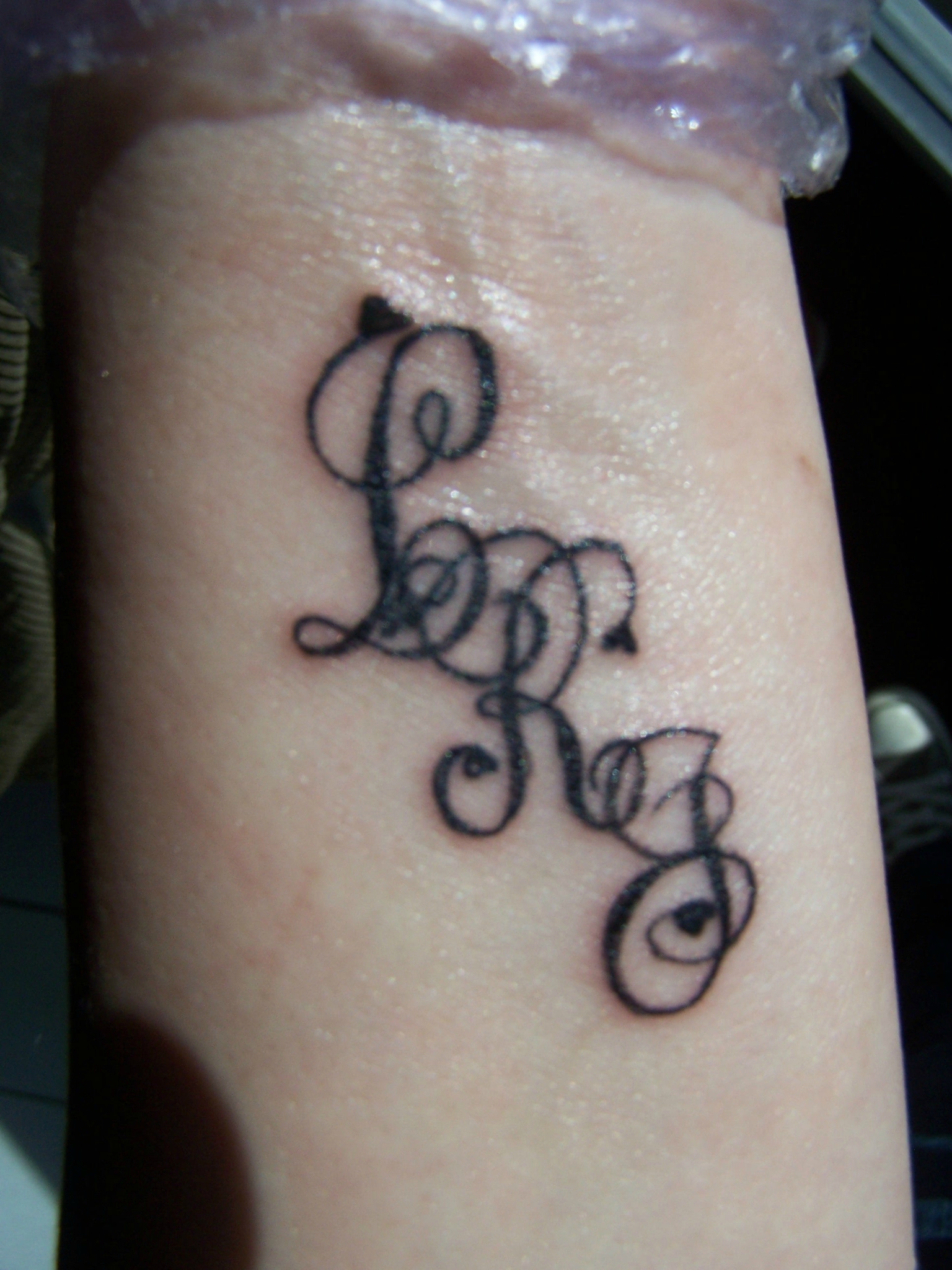 tatouage initiale m et s