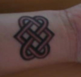 tatouage noeud bouddhiste