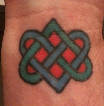 tatouage noeud bouddhiste