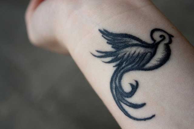 tatouage oiseau note de musique