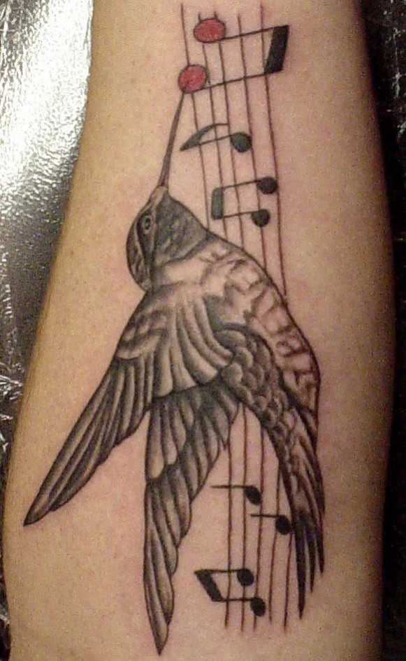 tatouage oiseau note de musique