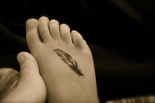 tatouage oiseau pied