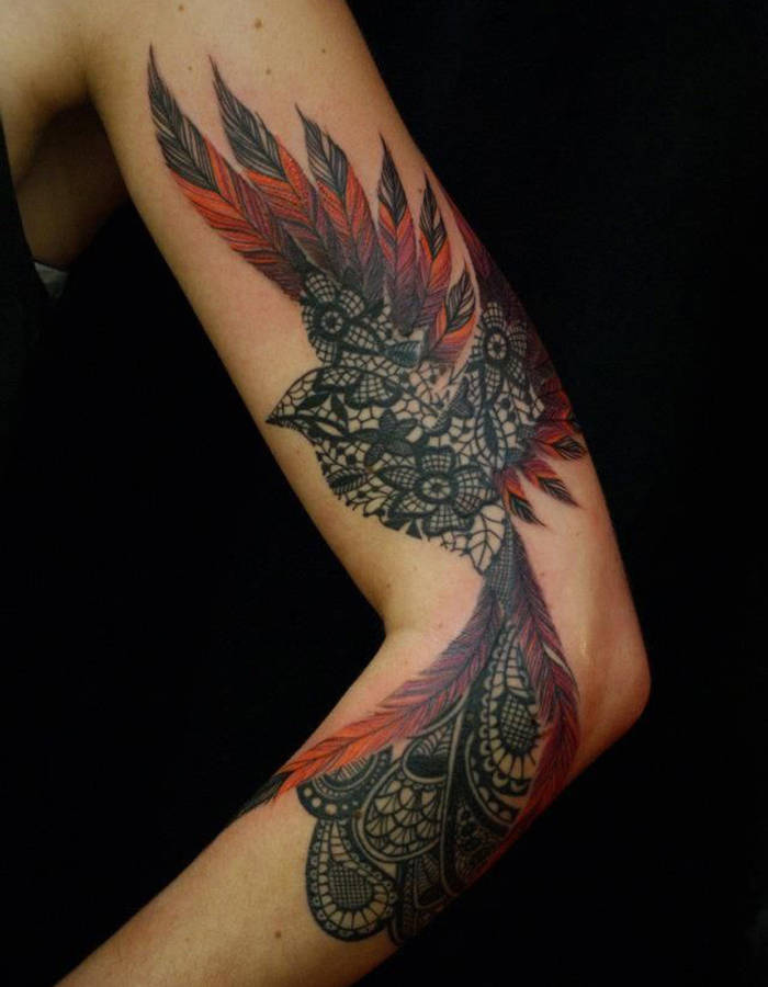 tatouage oiseau visage