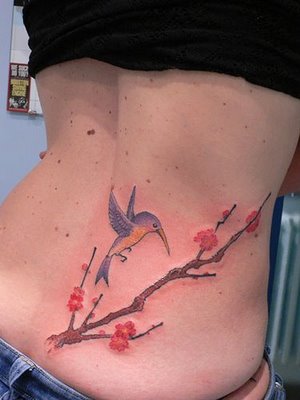 tatouage oiseaux sur une branche