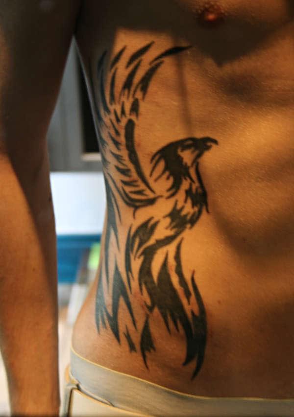 tatouage phoenix pectoraux