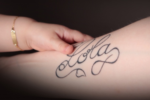 tatouage poignet prenom lucas