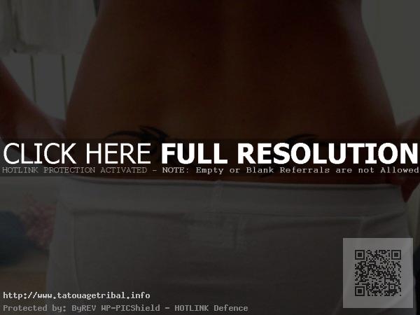 tatouage tribal femme bas du dos