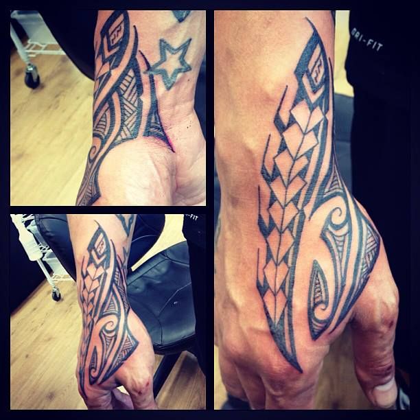 tatouage tribal main homme