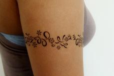 tatouage tribal tour de bras femme