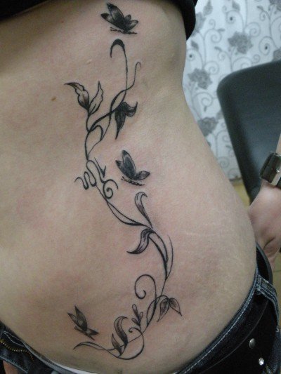 tatouage ventre arabesque