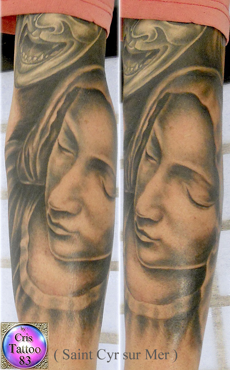 tatouage vierge marie avant bras