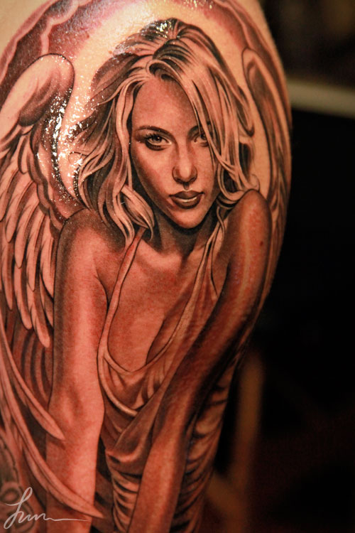 tatouage visage ange et démon