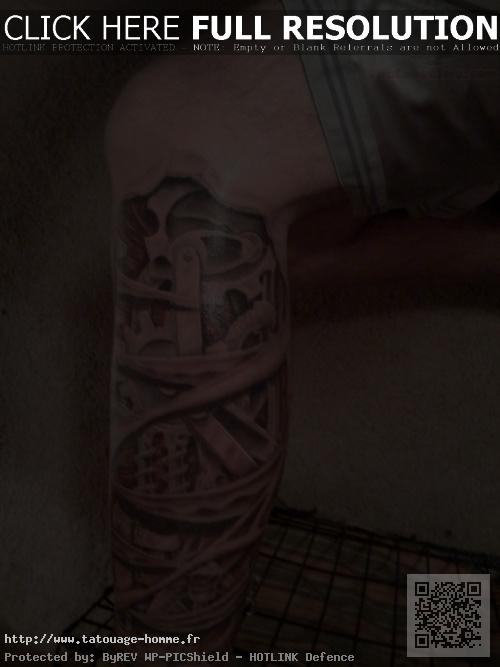 tattoo biomecanique jambe