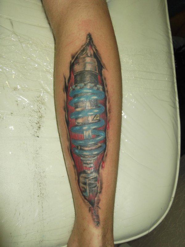 tattoo biomecanique mollet