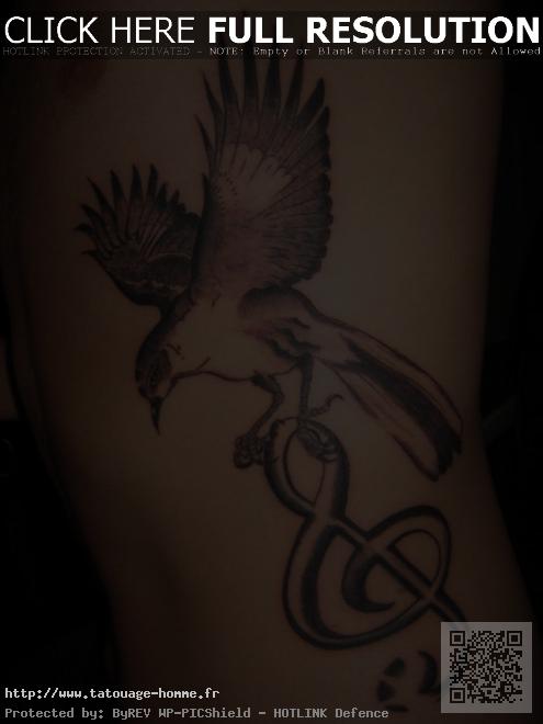 tattoo oiseau homme